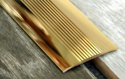 Латунный полированный порожек с рифлением (под шурупы сверху) STN