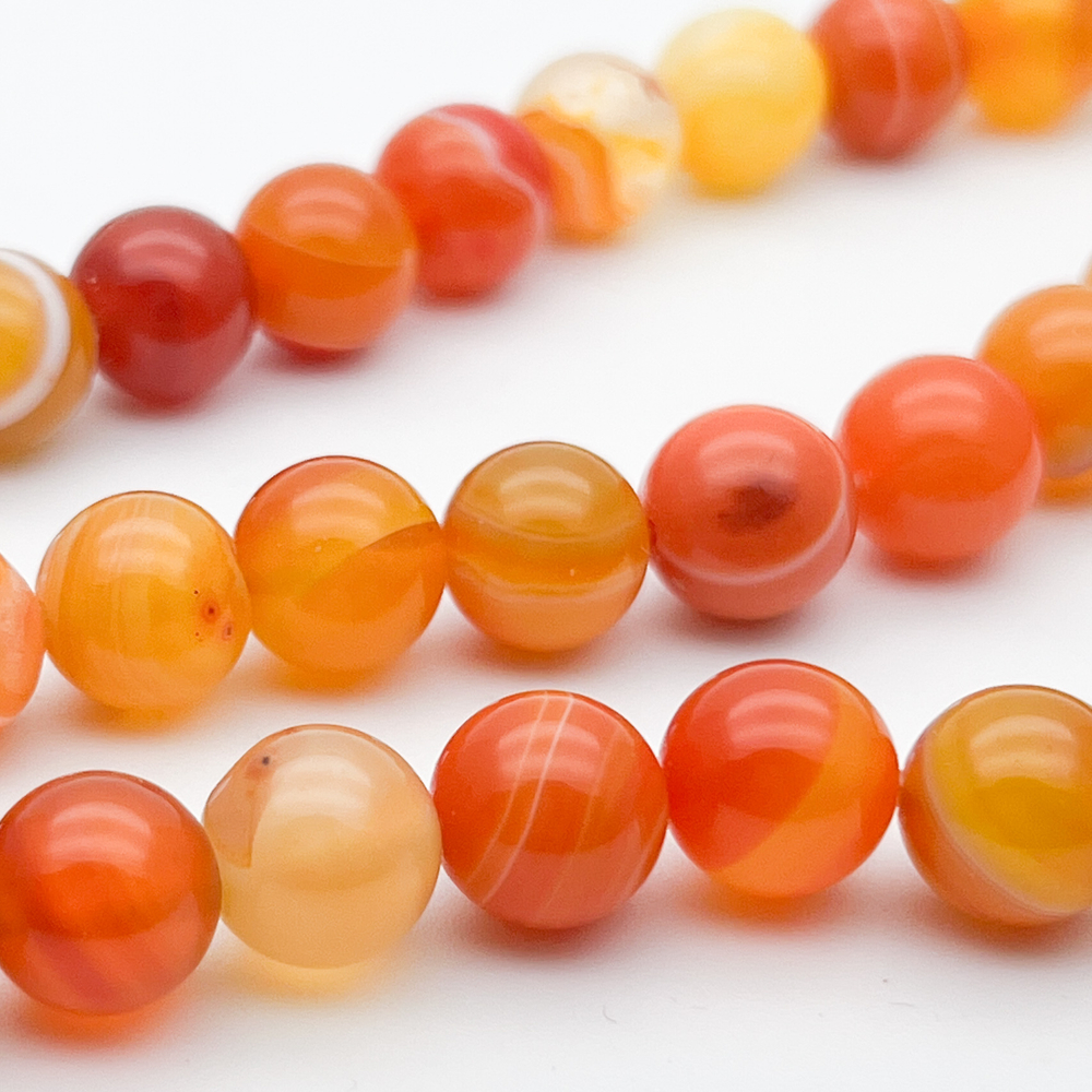 Агат тонированный ярко-оранжевый бусины, диаметр 10,4-10,5 мм, цена за 18 шт (1/2 нити)