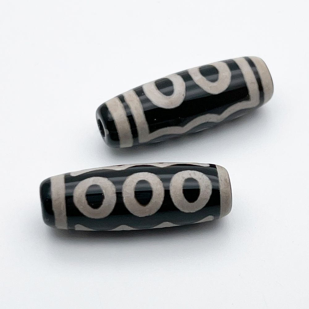 "Дзи" 5 Глаз, размер около 30*10 мм, цена за 1 шт