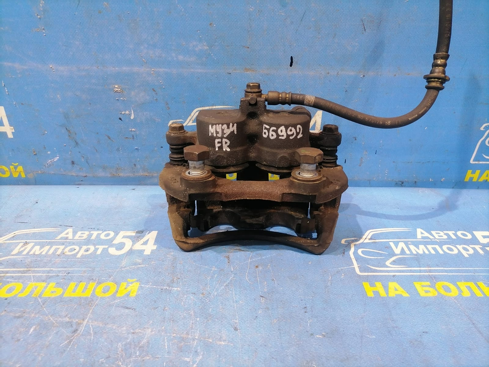 Суппорт тормозной передний правый NISSAN CEDRIC 1999-2004