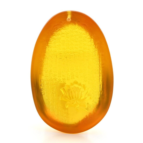 Кулон-амулет из янтаря Лотос 37*57мм, цв. медовый