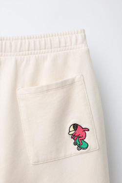 ZARA БРЮКИ BARREL ИЗ ФУТЕРА С ЛОГОТИПОМ, ЖЕЛТОВАТО-БЕЛЫЙ