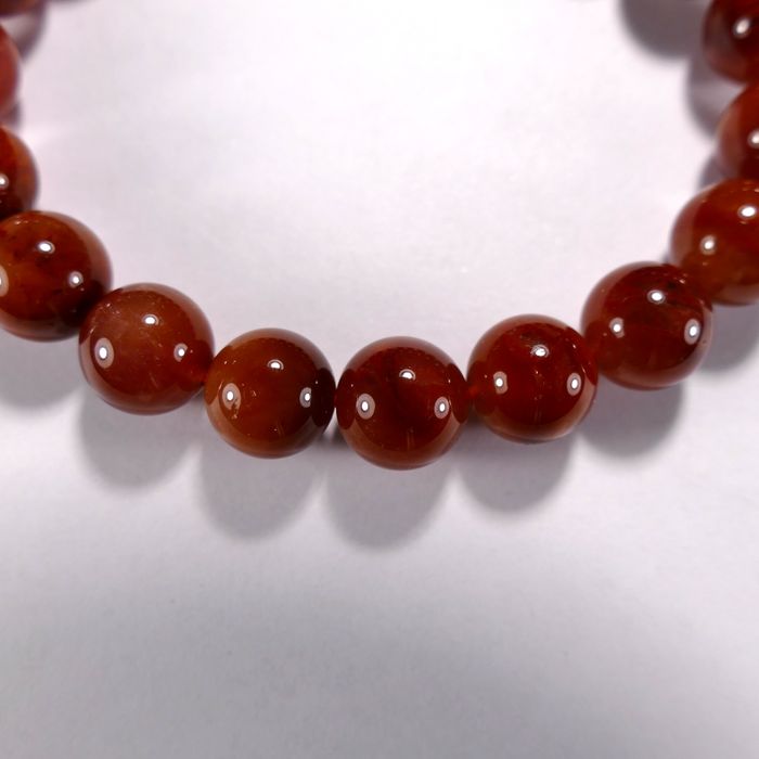 Бусина из кварца красного с нигрином, класс АА, шар гладкий 10 мм