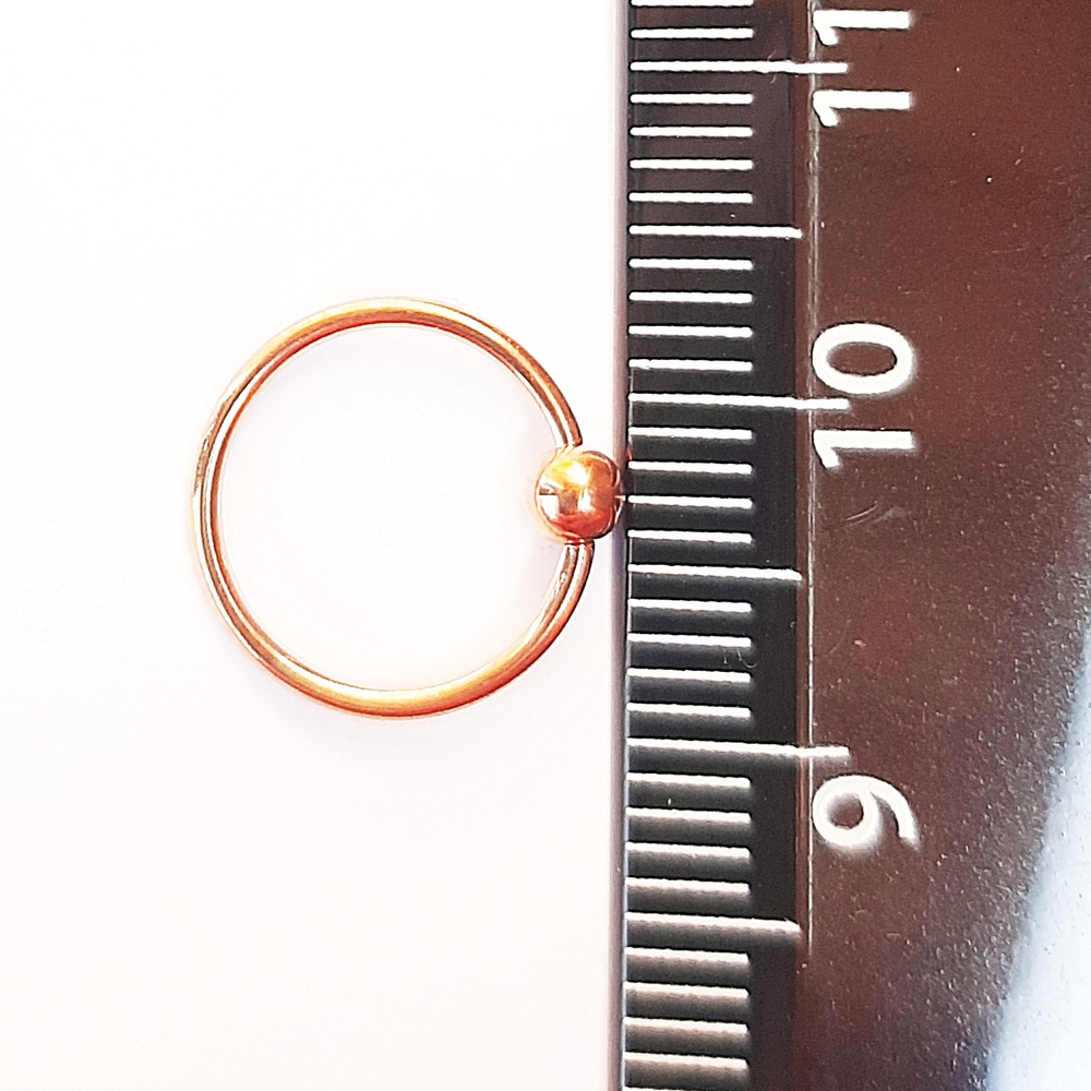 Кольцо сегментное диаметр 10 мм, шарик 3 мм, толщина 1,2 мм для пирсинга. Медицинская сталь, розовая позолота.