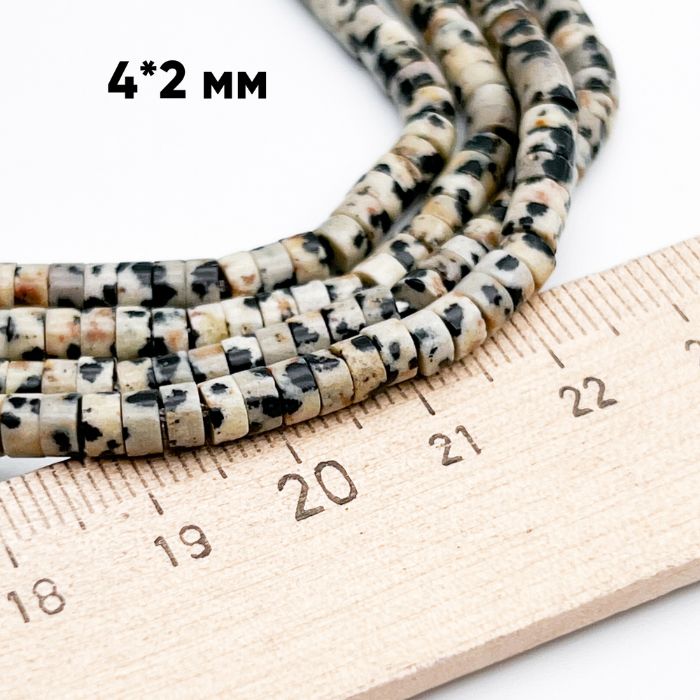 "Далматин" бусины (порфир), размер около 4*2 мм, цена за 37-38 шт (1/4 нити)