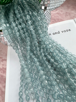 Нить бусин из тонированного кварца 8-9мм (галтовка)