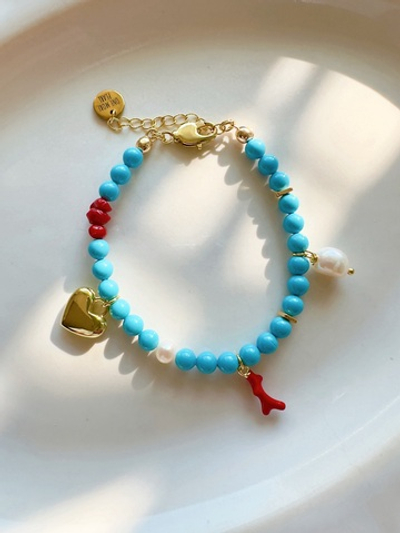 Браслет Сваровски с жемчугом и кораллом