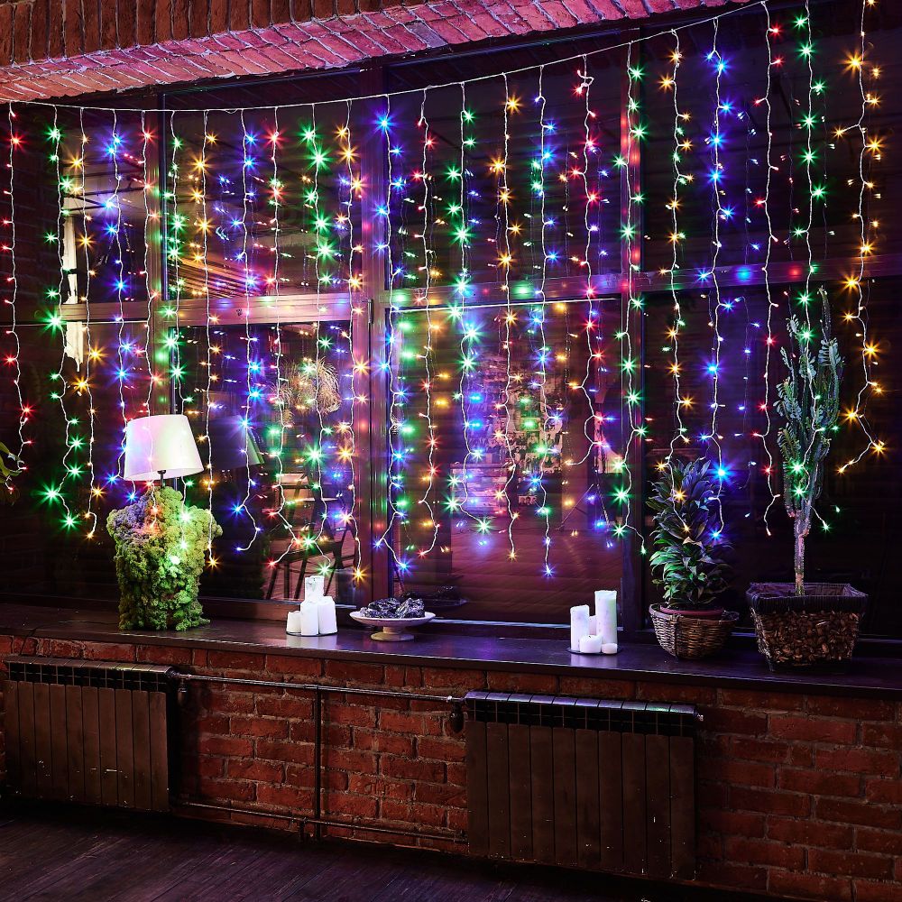 ULD-C3020-384-DTA-RC MULTI IP44 Занавес светодиодный. 3х2м. 384 светодиода. Разноцветный свет. Провод прозрачный. Пульт ДУ в-к. TM Uniel