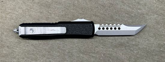 Нож-автомат фронтальный Microtech DAYTONA - сталь М390, рукоять черный алюминий + стеклобой