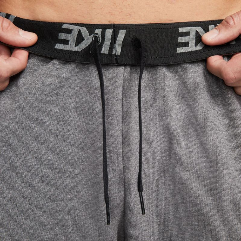 Мужские теннисные штаны Nike Dry Pant Taper FA Swoosh - серый