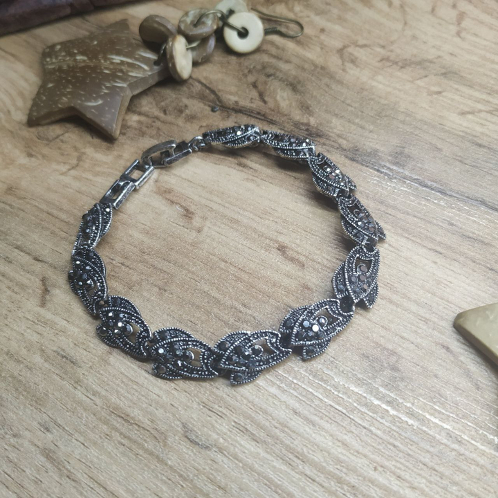 Браслет Vogue 2 3 лепестка стразы графитовые металл серебристый