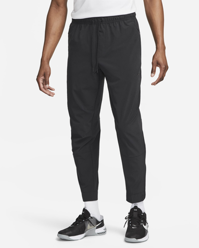 FB7548-010 Брюки M NIKE DF UNLIMITED PANT TPR