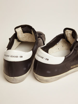 Super Star in black leather with white leather star and heel tab