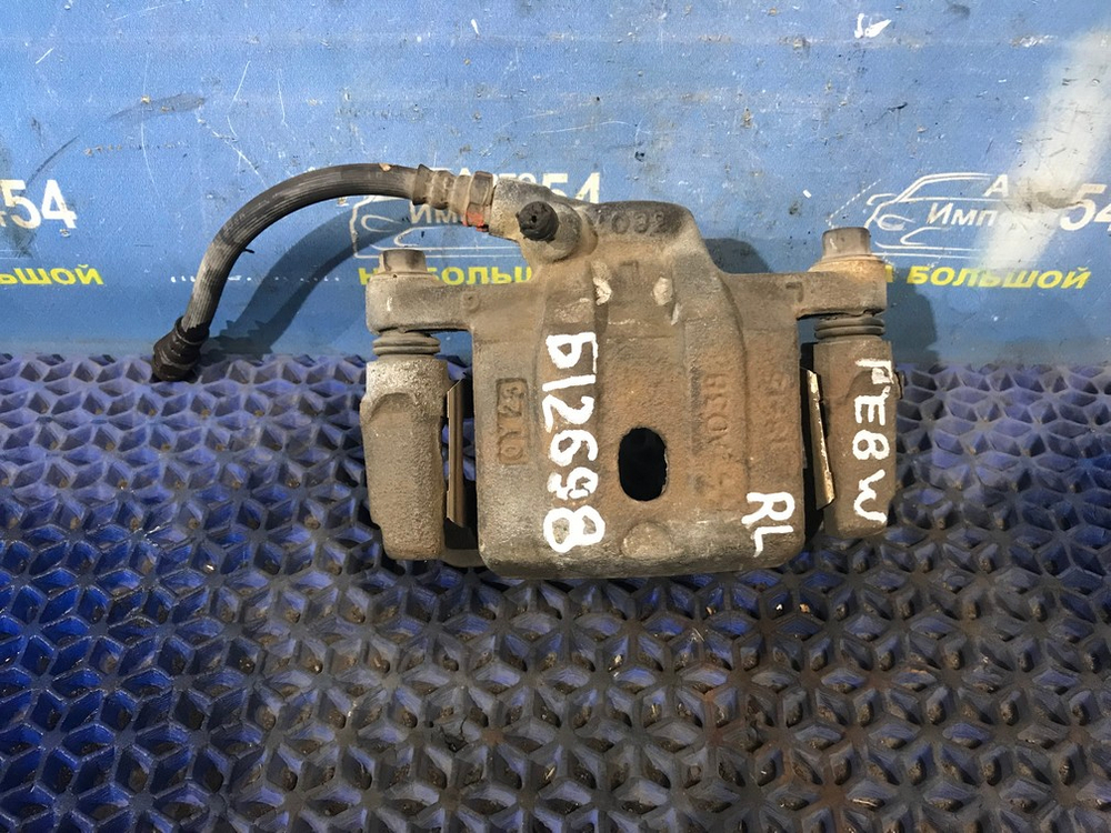 Суппорт тормозной задний левый MITSUBISHI DELICA 1997-2007