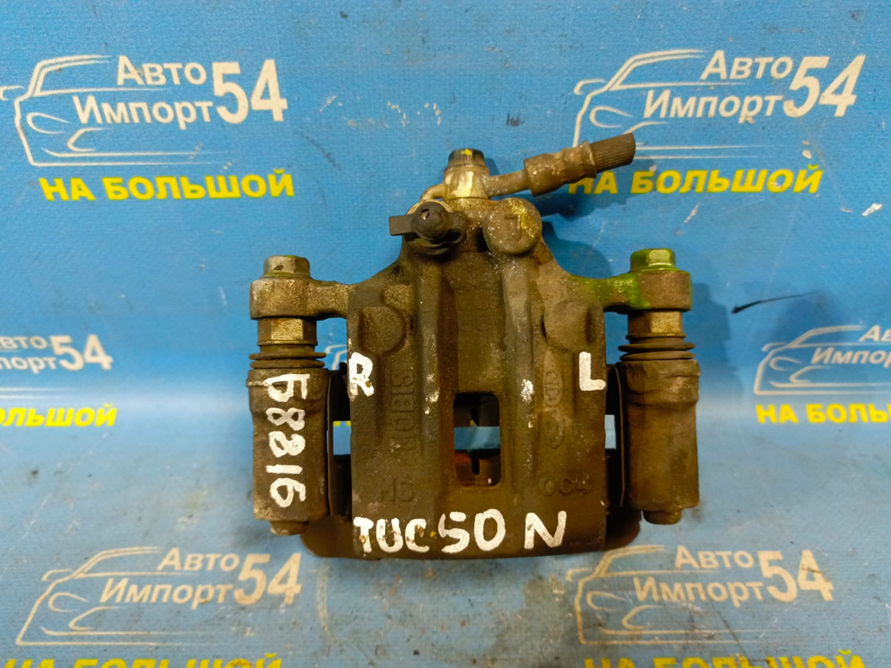 Суппорт тормозной задний левый HYUNDAI TUCSON 2009-2013