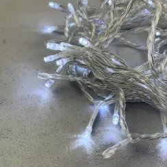 Светодиодная нить 100 белых LED ламп с мерцанием, 10 м., 24В., прозрачный провод ПВХ, LTC (PST100BLW-10-1W)