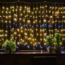 ULD-C2030-240-TTK WARMWHITE-WHITE IP44 Занавес светодиодный с эффектом мерцания. 3х2м. Соединяемый. 240 светодиодов. Теплый белый и белый свет. Провод прозрачный. TM Uniel.