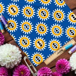 Ткань интерлок солнечные глаза на голубом фоне