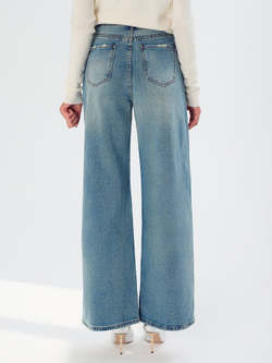 Джинсы с обработанным краем