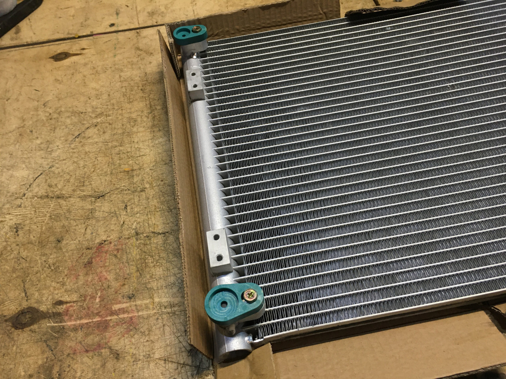 Радиатор кондиционера 208-979-7520