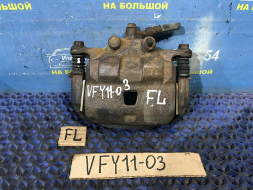 Суппорт тормозной передний левый NISSAN AD 2001