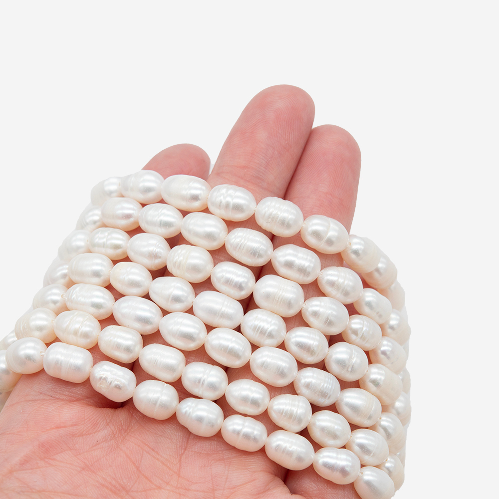 Жемчуг культивированный овальный с бороздками, белый, 6*9мм