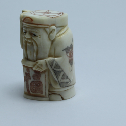 Нэцкэ Дзюродзин с веером и иероглифом Счастье