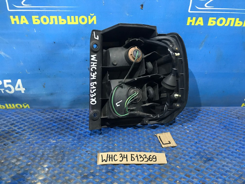 Стоп левый NISSAN STAGEA 1996-1998