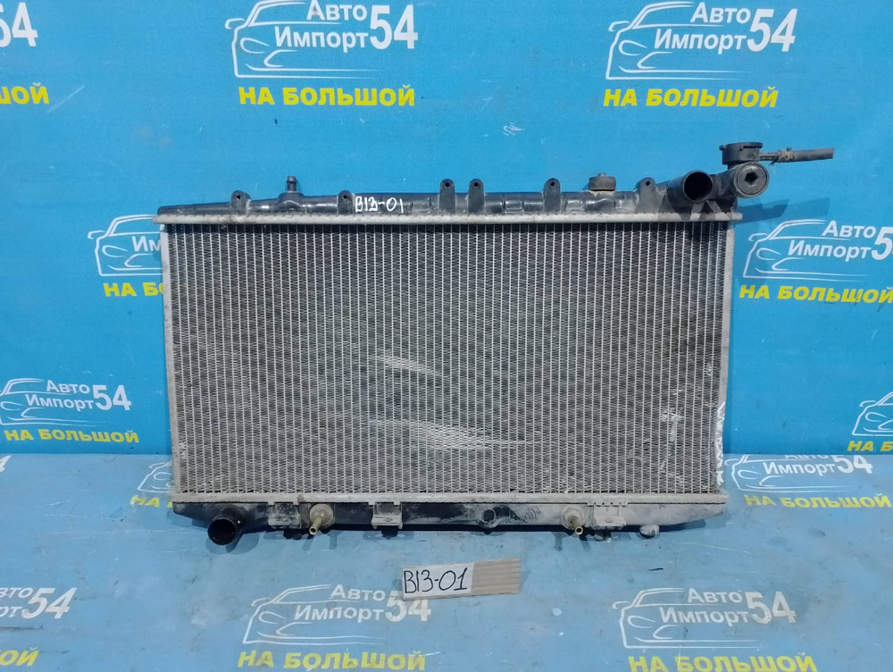 Радиатор двигателя NISSAN SUNNY 1991