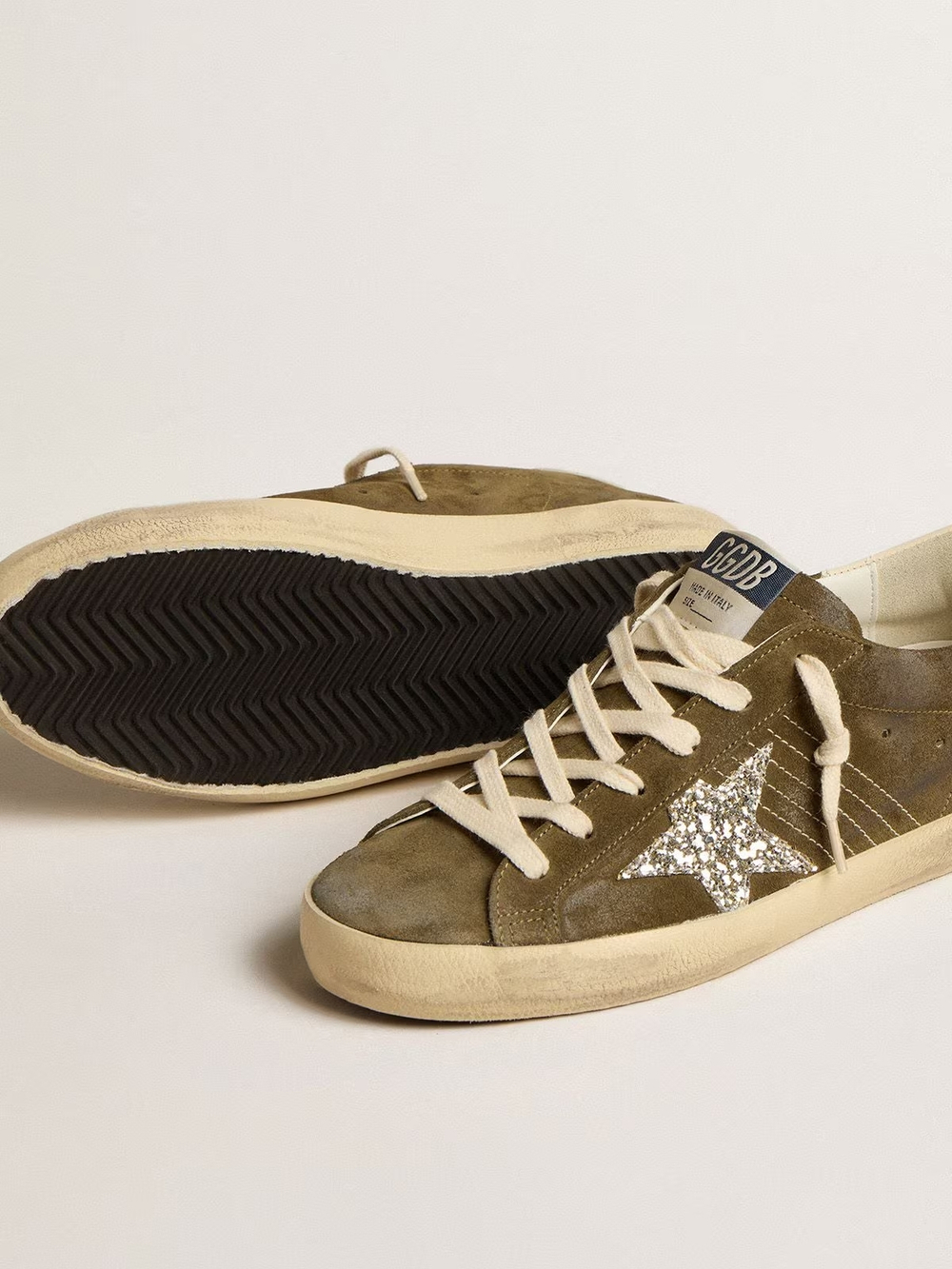 Super Star in green suede with glitter star and cream heel tab