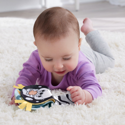 Fisher-Price - Подушка для живота Rocking Otter 2в1 с мягкой книжкой HXG96/ артикул HXG96 / GTIN 194735229666