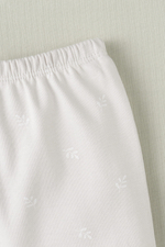 К 4718/белые веточки на бежевом брюки для девочки