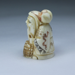 Нэцкэ Фукурокудзю с тыквой горлянкой и корзиной рыбы