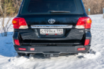 Бампер силовой задний Toyota Land Cruiser 200 2012-2015 с квадратом под фаркоп и фонарями, стандарт РИФ