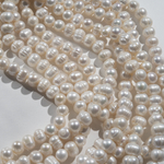 Жемчуг культивированный крупный овальный с бороздками, белый, 11*8мм