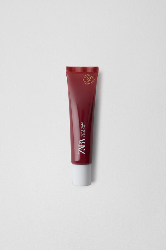 ZARA Блеск для губ с SPF 50, черника