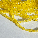 Хрустальные бусины в форме треугольника, оттенок "Желтый", 2,5*3мм