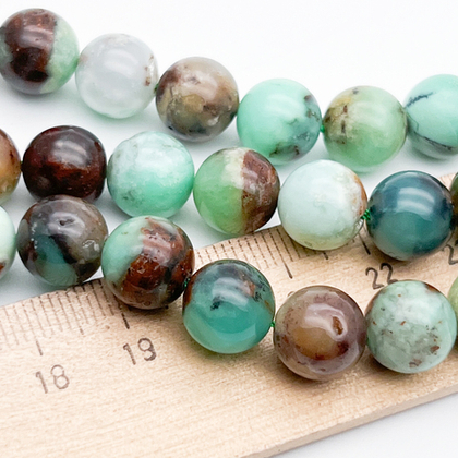 Хризопраз с включениями бусины, диаметр около 10,2-10,4 мм, цена за 9 шт (1/4 нити)