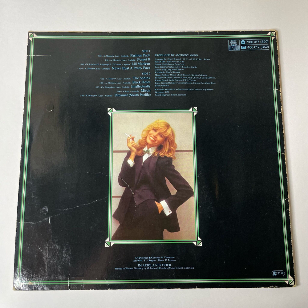 Винтажная виниловая пластинка LP Amanda Lear Never Trust A Pretty Face (Germany 1979)