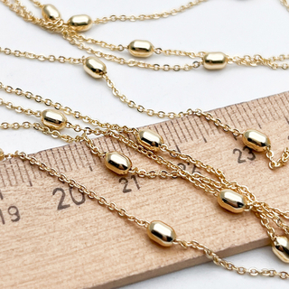 Цепочка, цвет золото, размер звена 1*1,5 мм, бусина 4,5*3 мм, цена за 50 см