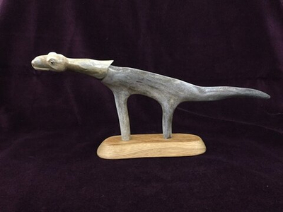 Динозавр, скульптура. Резная кость