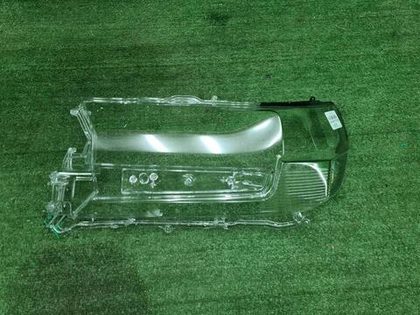 Стекло фары левое Toyota Land Cruiser 200 (15-21)