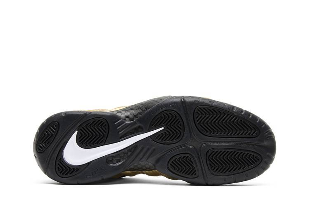 Nike foamposite black gold top