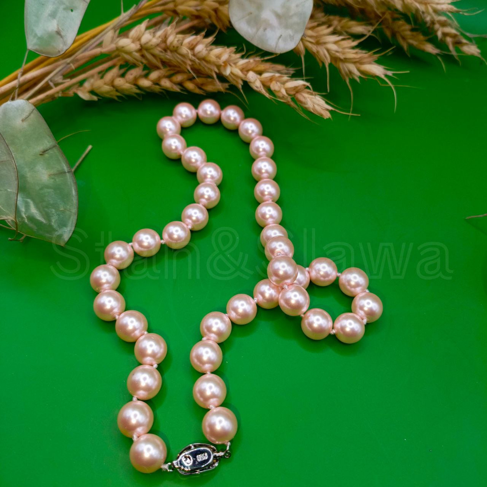 Ювелирное ожерелье из ракушек 10мм.