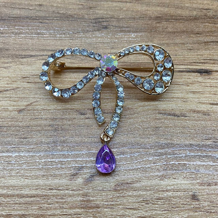 Брошь Бантик тонкий кристалл хамелеон стразы подвеска капля сиреневая металл золотистый