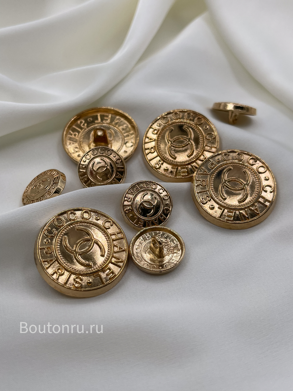 Пуговицы Шан. на ножке золотистые лого