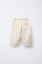 Брюки baggy из рельефной ткани в клетку