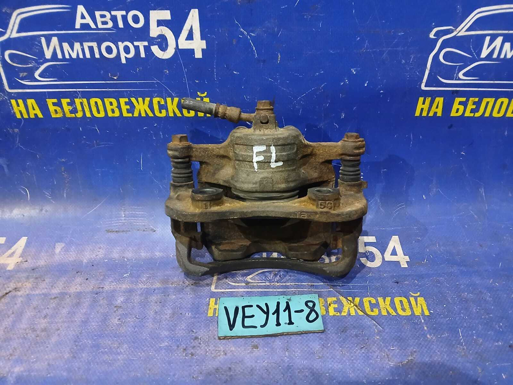 Суппорт тормозной передний левый NISSAN AD 2001