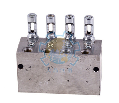 KW-22 - Питатель для двухлинейных систем смазки с рабочим давлением 200 бар, количество выходов 2, максимальная доза 0,6 мл/цикл, с регулятором и индикатором