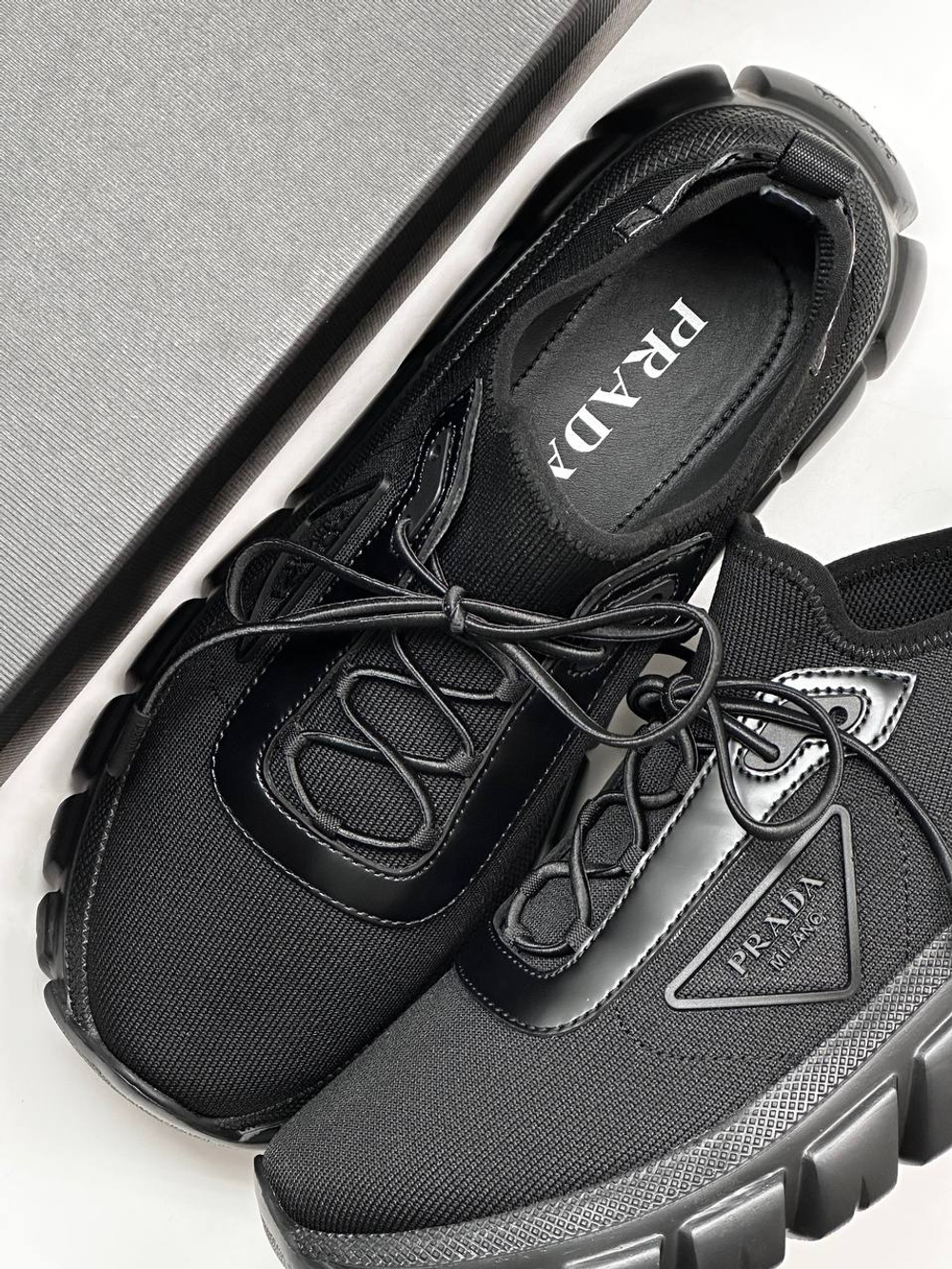 Кроссовки Prada